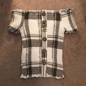 White and green off the shoulder tight shirt